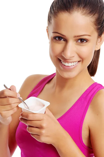 Woman eating yoghurt — Stock Photo, Image