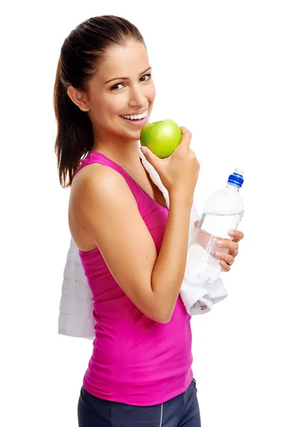 Žena s vodou a apple — Stock fotografie