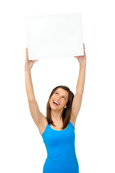 Mujer sosteniendo tablero en blanco — Foto de Stock