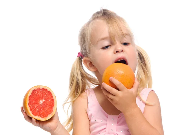 Lambe uma rapariga de toranja. — Fotografia de Stock