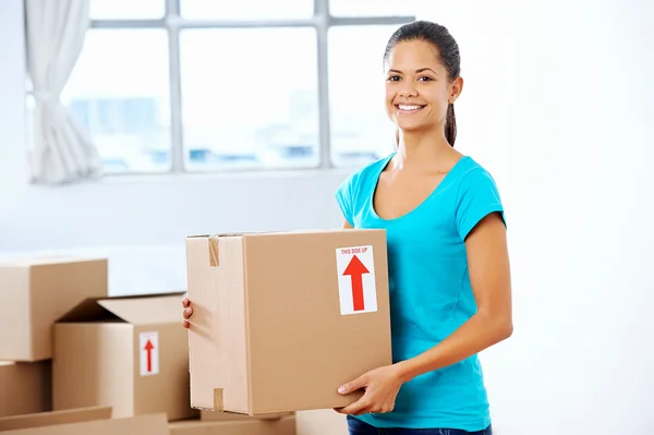 Girl moving in box — Stock Photo, Image