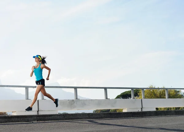 Athlete running outdoors — Stock Photo, Image