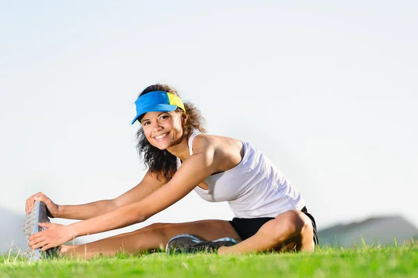 Stretching athlete — Stock Photo, Image