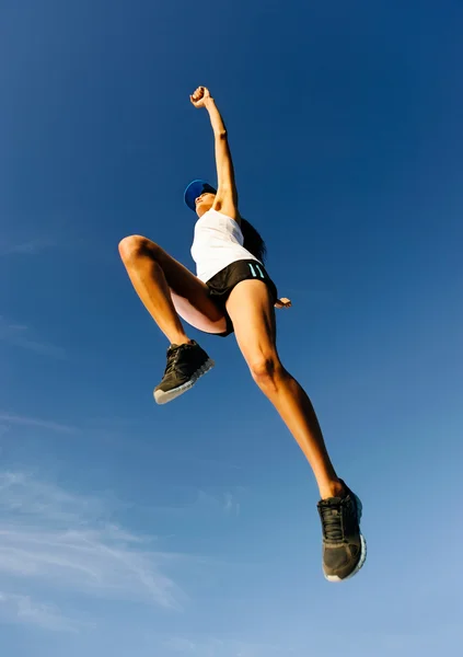 Jumping runner — Stock Photo, Image