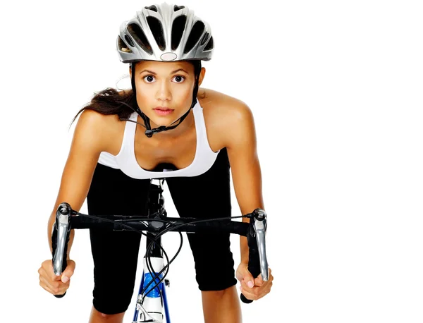 Pretty active cyclist holding to handlebars on a road bike in st — Stock Photo, Image