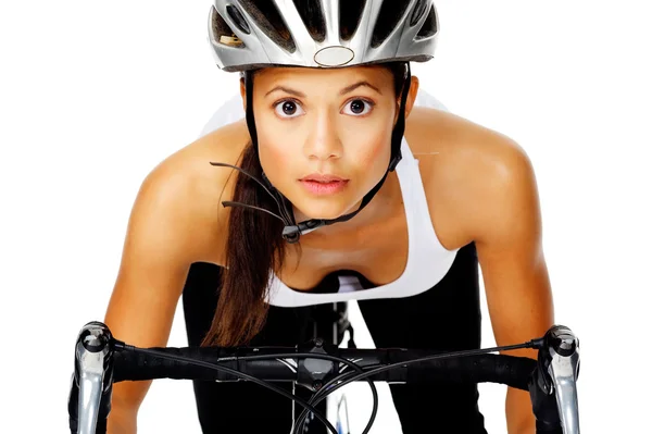 Pretty active cyclist holding to handlebars on a road bike in st — Stock Photo, Image