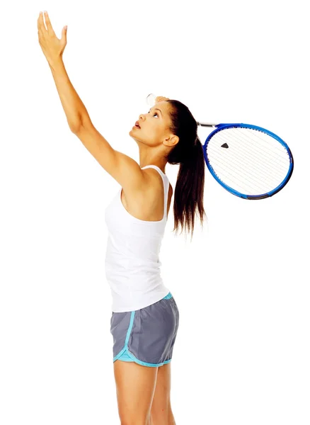 Sporty woman pretends to serve in a tennis game, isolated on whi — Stock Photo, Image