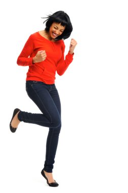 Excited woman jumps in joy