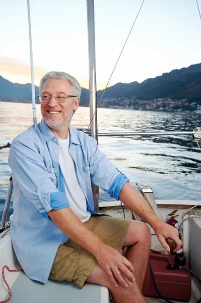 Happy sailing man boat — Stock Photo, Image