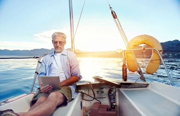 Tablet computer on boat — Stock Photo, Image