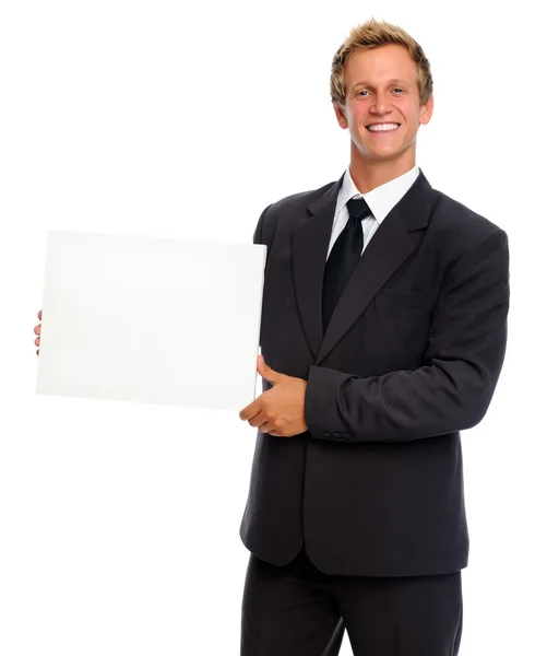 Primer plano de las manos del hombre mostrando tablero blanco en blanco — Foto de Stock