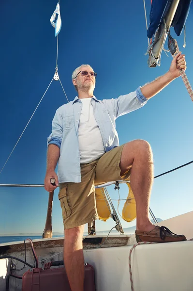 Sailing man captain Stock Photo