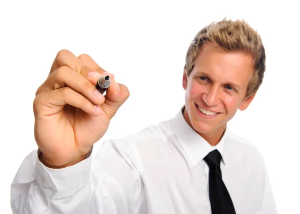 Smiling young businessman holds pen Stock Picture