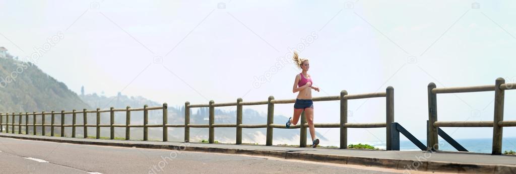 Panoramic runner on beach