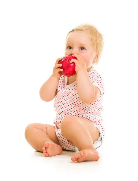 Leuke baby meisje learining om te eten met lepel — Stockfoto