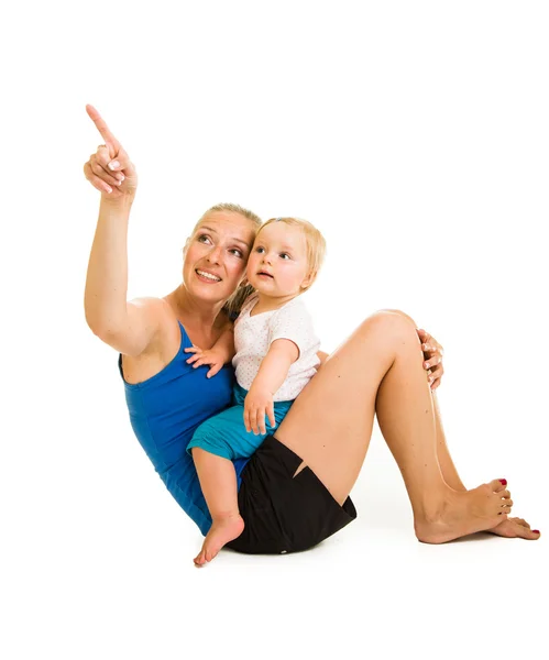 Cute infant girl with mother isolated on white — Stock Photo, Image