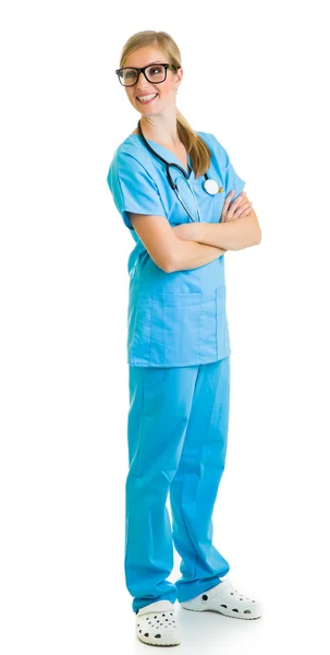 Kvinna i läkare kostym isolerad på vit — Stockfoto