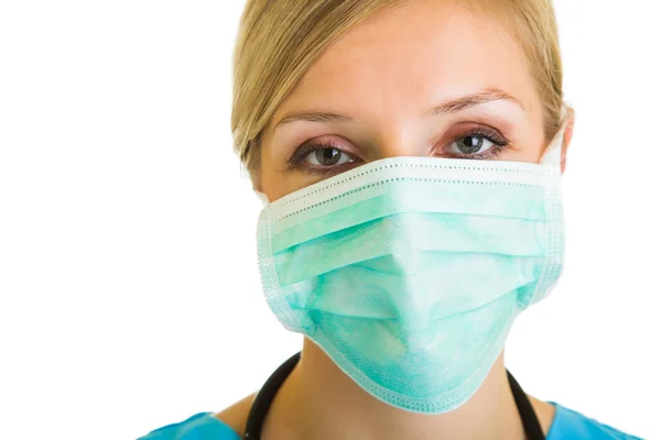 Mulher médico vestindo máscara protetora — Fotografia de Stock