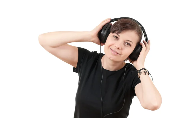 Portret pięknej młodej kobiety słuchającej muzyki — Zdjęcie stockowe