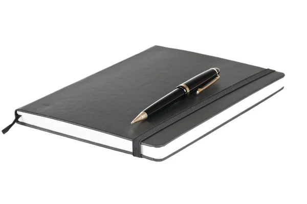 Black notebook and pen — Stock Photo, Image