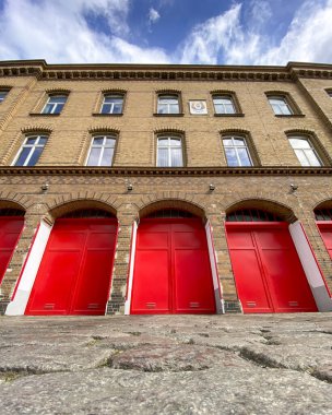 Bright red doors of a fire station in Berlin, Germany