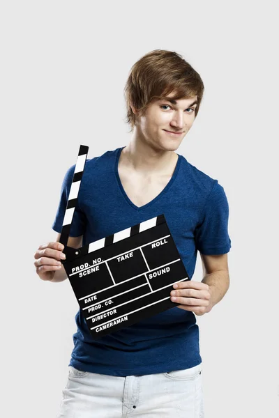 Holding a clapboard — Stock Photo, Image