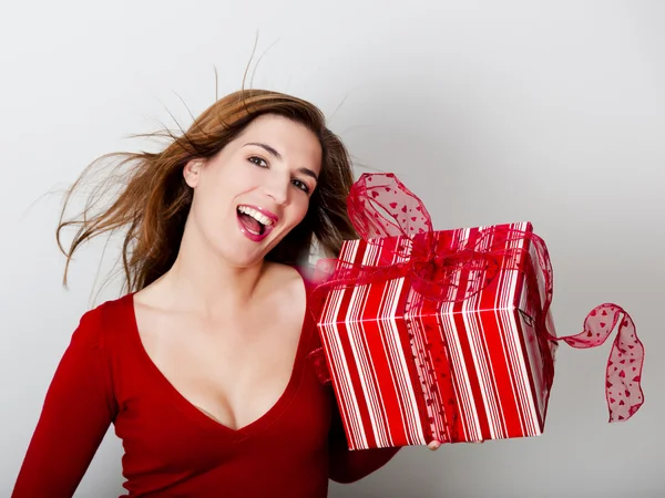 Woman with a big present — Stock Photo, Image