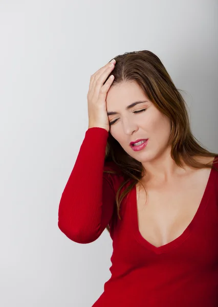 Woman with a headache — Stock Photo, Image