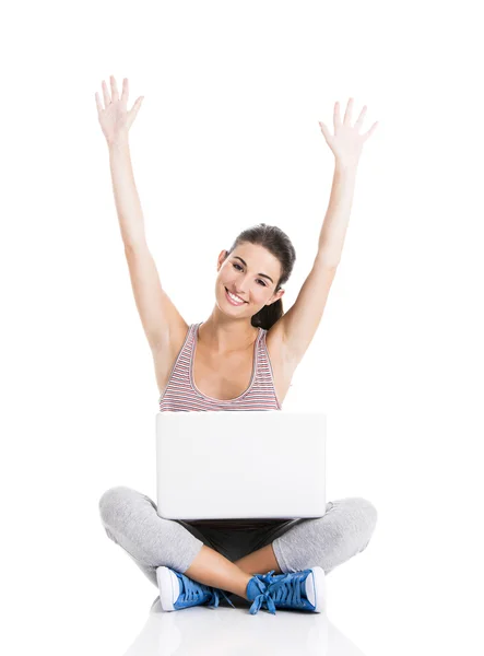 Happy student with a laptop — Zdjęcie stockowe