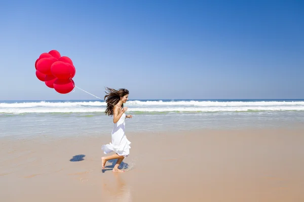 Running with ballons — Stock Photo, Image