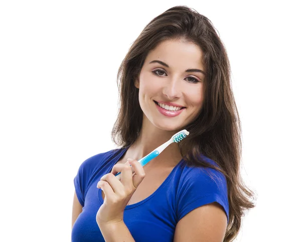 Mulher bonita com uma escova de dentes — Fotografia de Stock