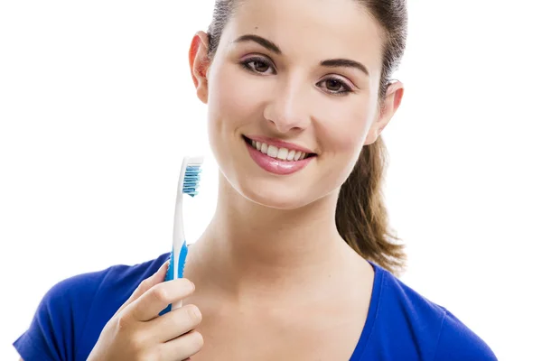 Hermosa mujer con cepillo de dientes — Foto de Stock