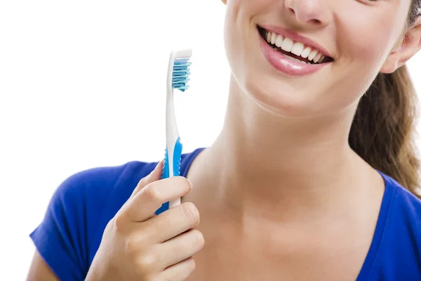 Mulher bonita com uma escova de dentes — Fotografia de Stock