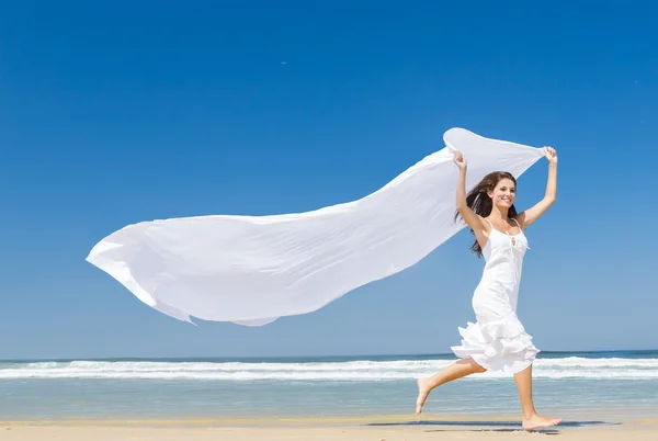 Jumping with a white scarf — Stock Photo, Image