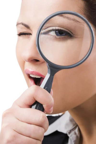 Business holding a magnifying glass — Stock Photo, Image