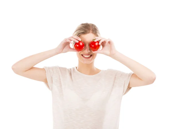 Femme Beaitiful avec des tomates devant le visage — Photo