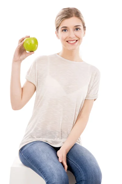 Szép nő, egy zöld almával — Stock Fotó