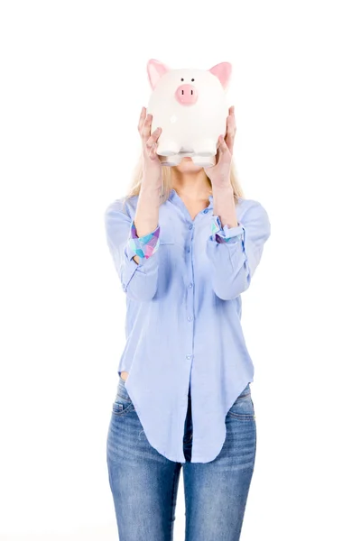 Beautiful woman holding a piggy bank — Stock Photo, Image