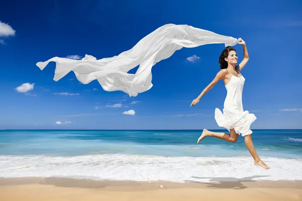 Jumping with a white tissue — Stock Photo, Image