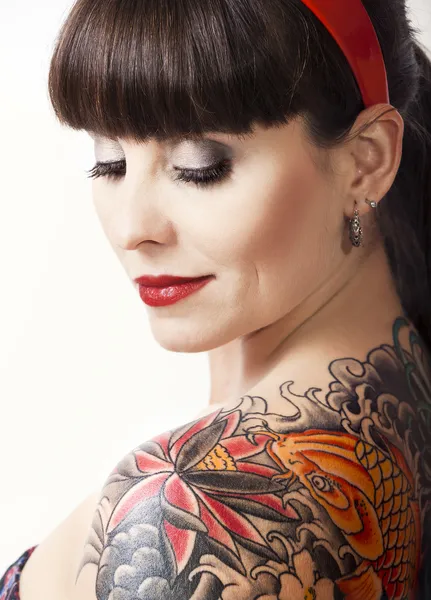 Vintage woman with a tattoo — Stock Photo, Image