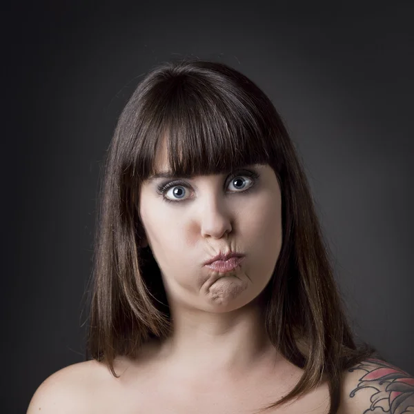 Funny woman with full cheeks — Stock Photo, Image