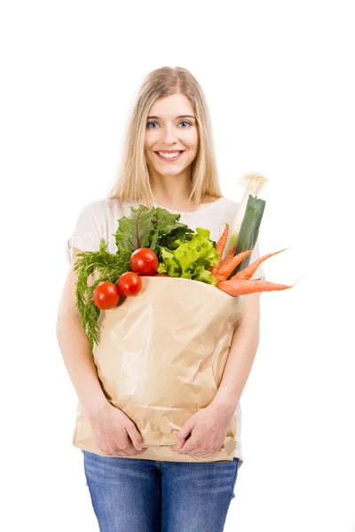 Piękna kobieta, prowadzenie warzyw — Zdjęcie stockowe