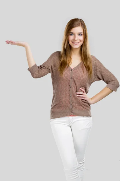 Woman showing something — Stock Photo, Image