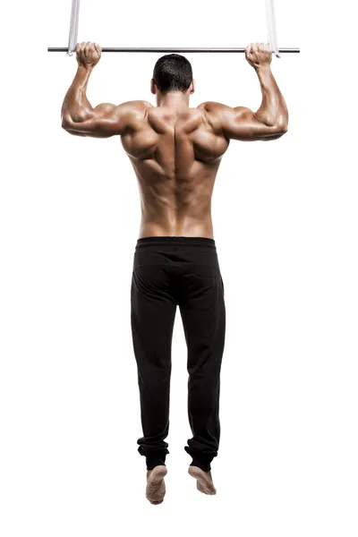 Muscle man making elevations — Stock Photo, Image