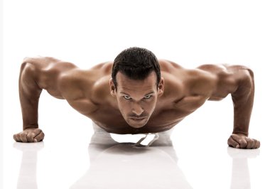 Muscle man dmaking push ups clipart