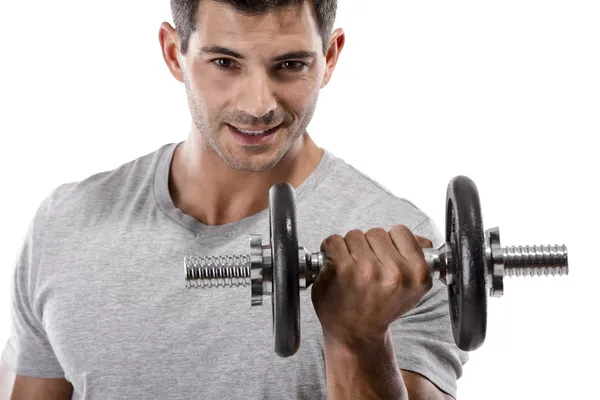 Athletic man lifting weights — Stock Photo, Image