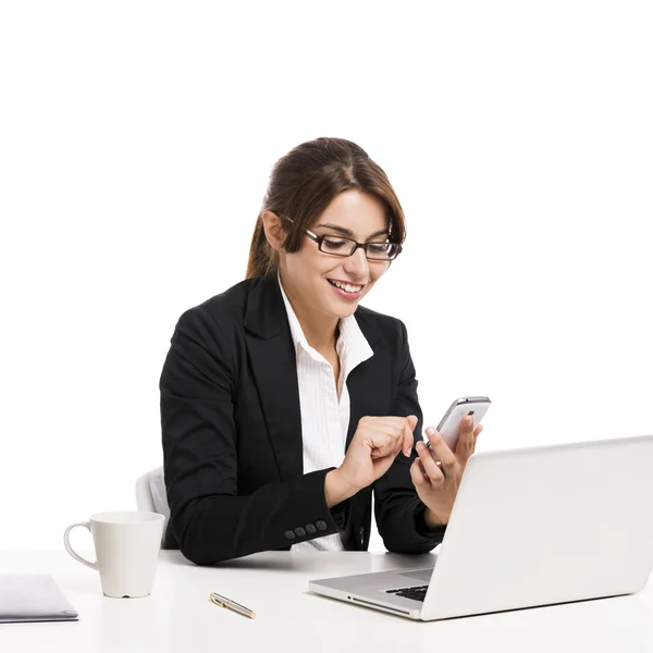 Businesswoman answering phone — Stock Photo, Image