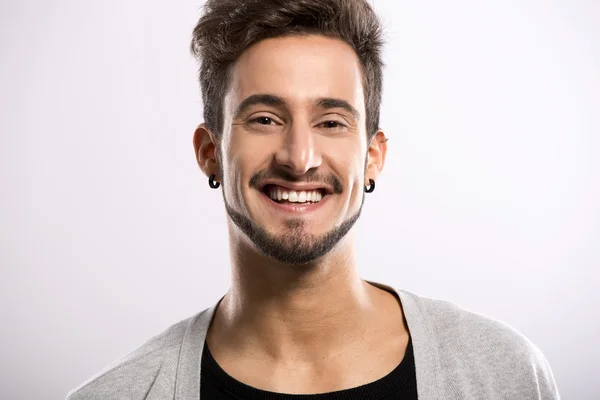 Young man smiling — Stock Photo, Image