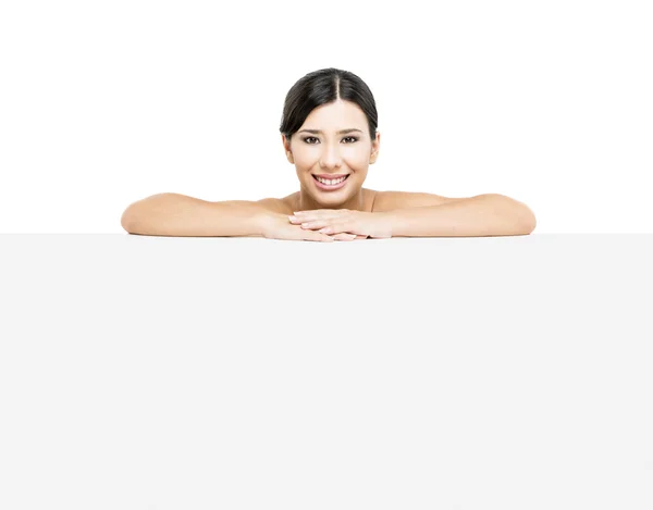 Asian woman showing a blank billboard — Stock Photo, Image