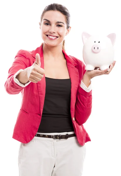 Business woman with a piggy bank — Stock Photo, Image